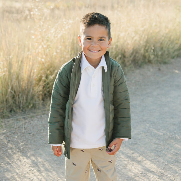 boy in winter coat, white polo and chino pants for boys and toddlers